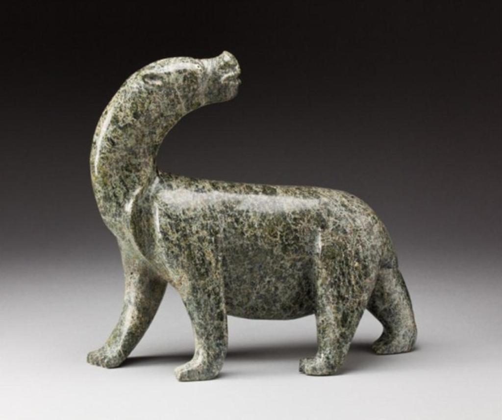 Nuveeya Ipellie (1920-2010) - Bear looking backwards, early 1990s, mottled green stone, 12.625 x 13.25 x 5 in, 32.1 x 33.2 x 12.7 cm