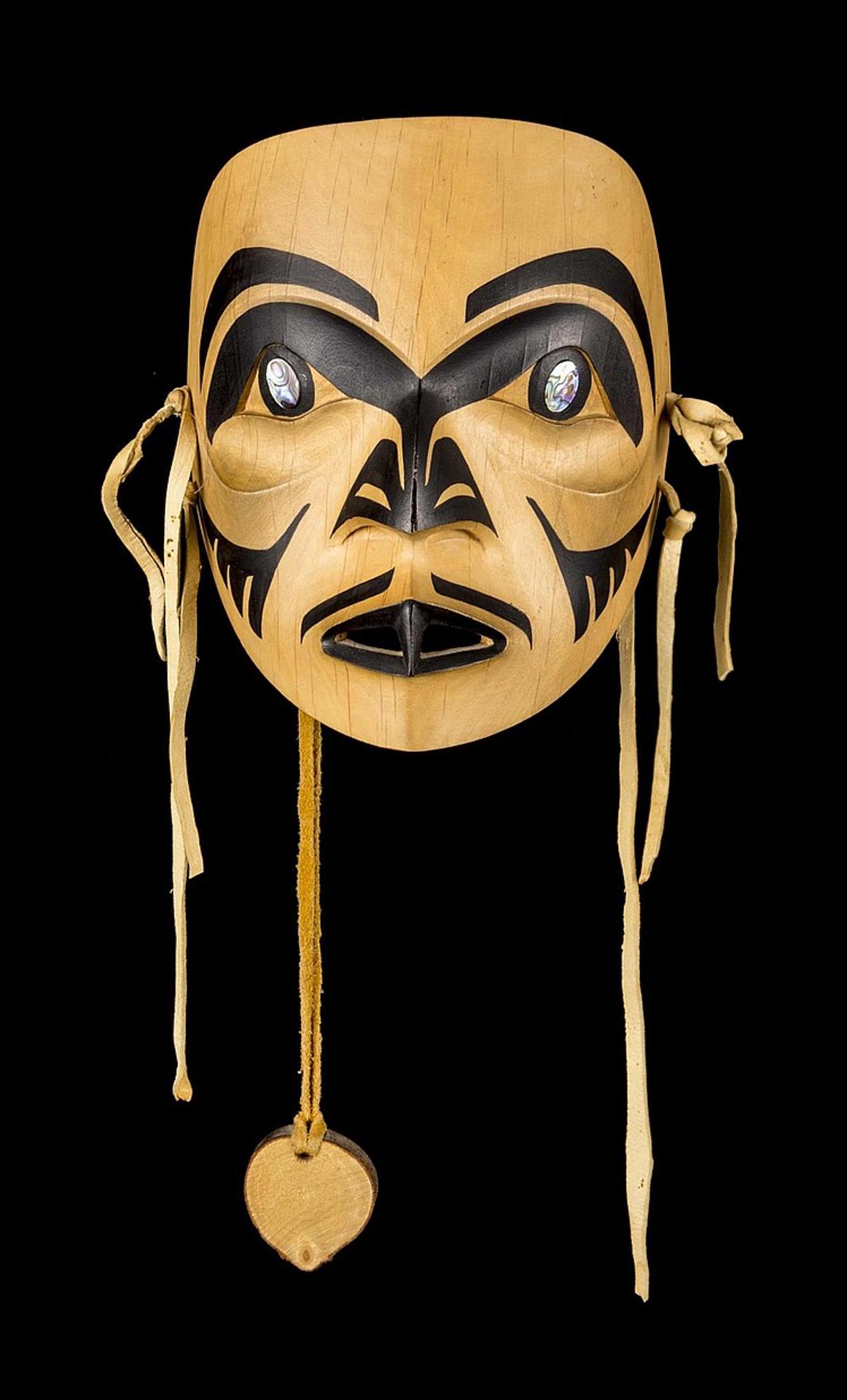 Chester Mclean - a carved and polychromed hawk mask