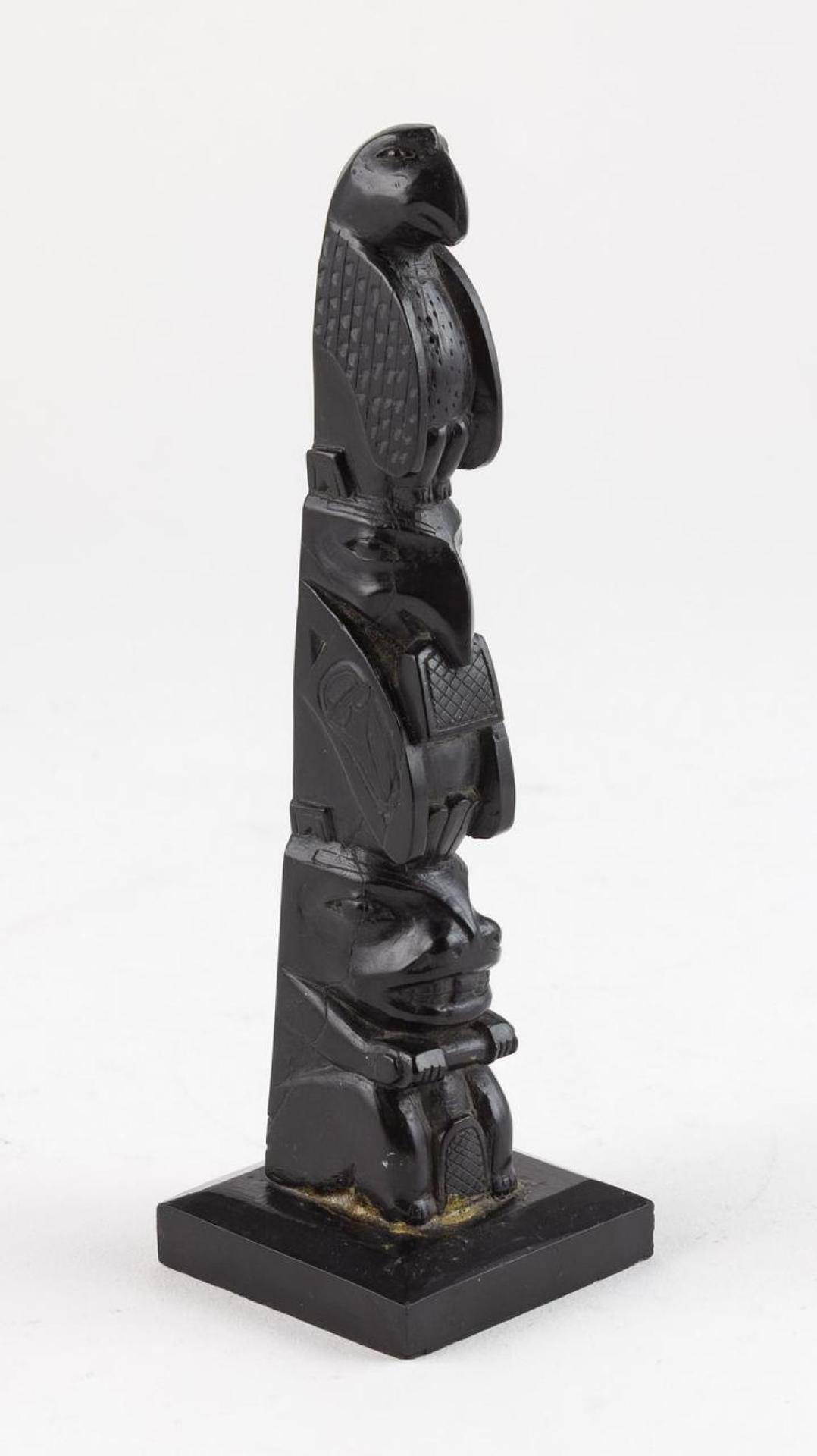 Ed Calder - a carved argillite totem pole