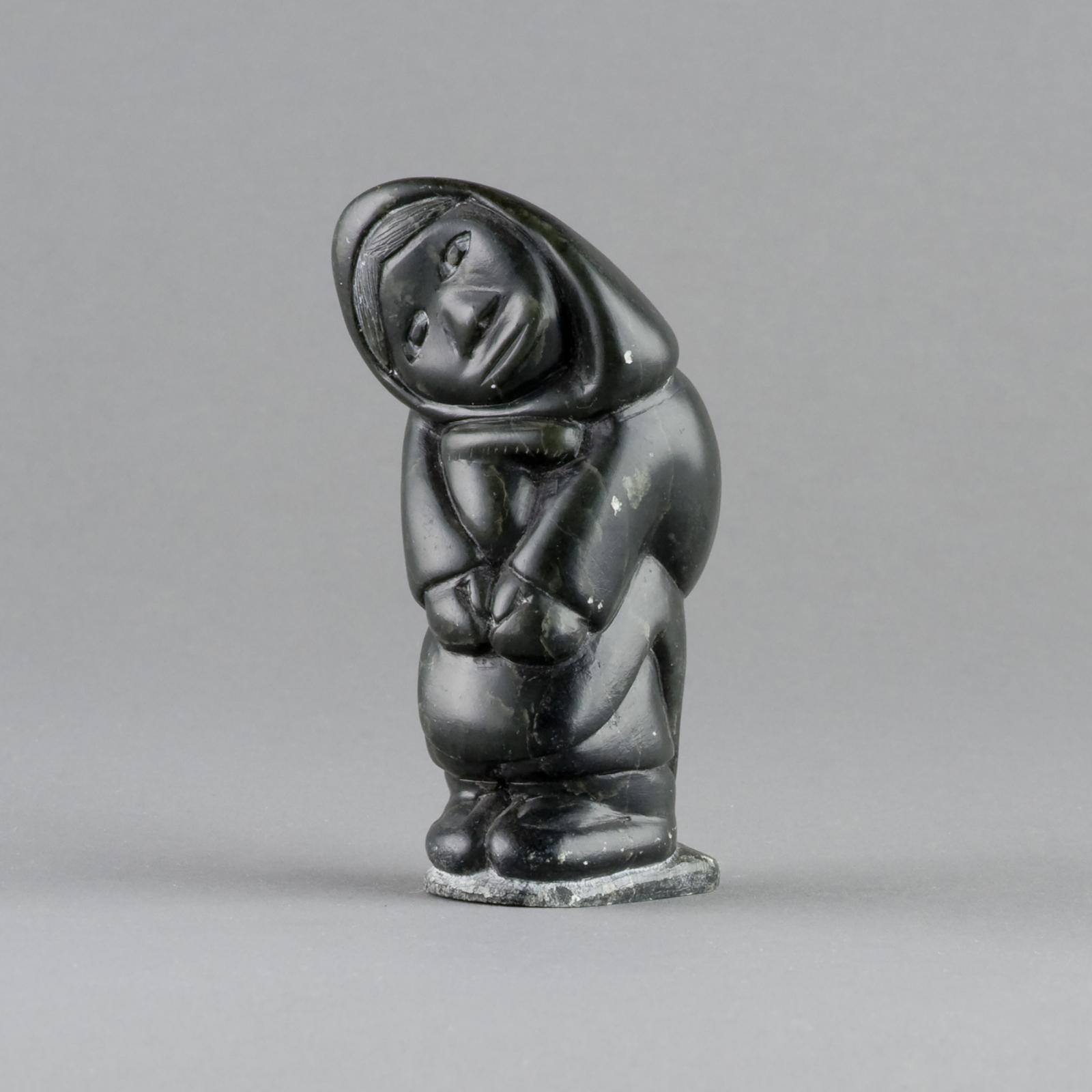 Joanassie Oomayoualook (1934) - Woman Holding A Kamik