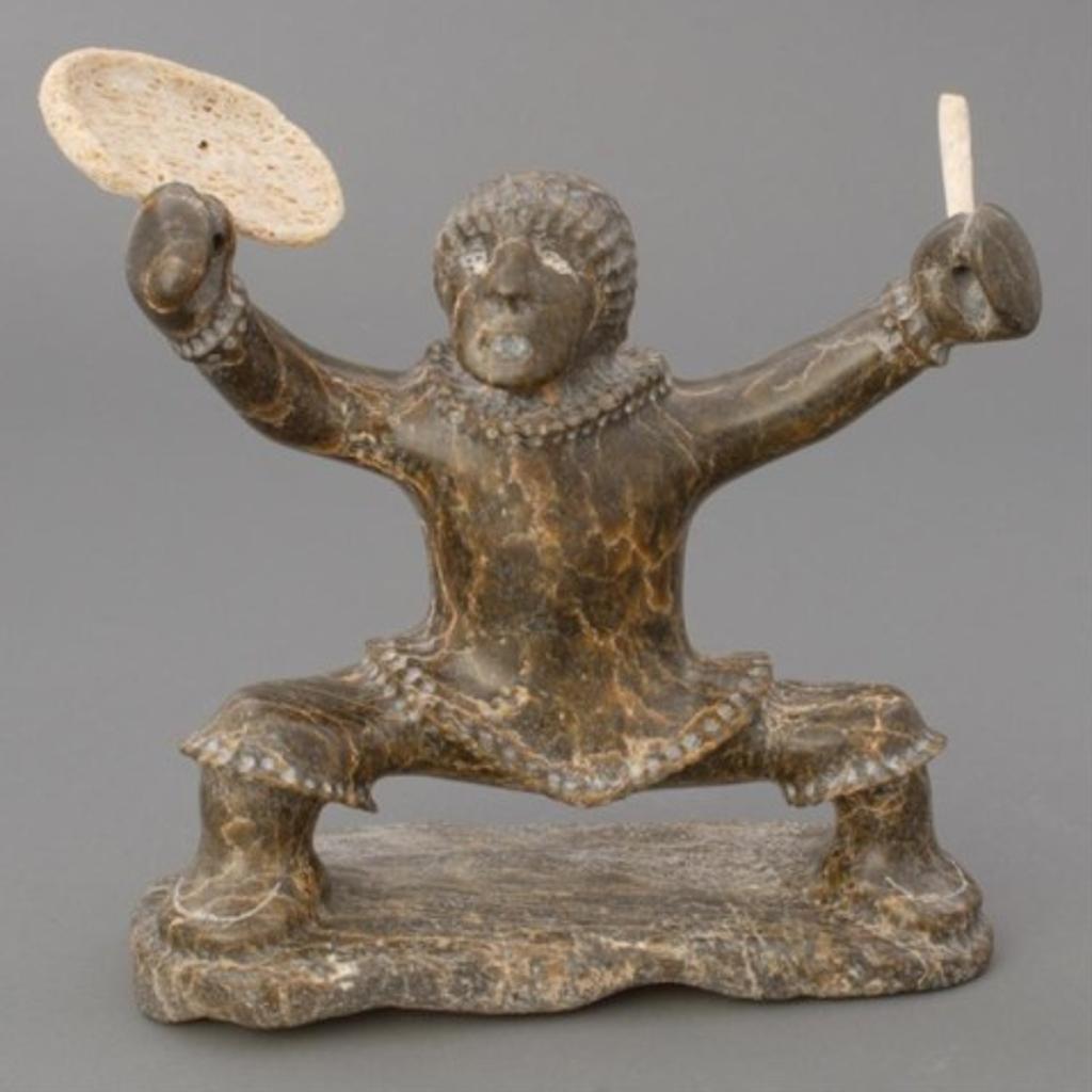 Moses Tiglik - Green/beige stone carving of a drum dancer
