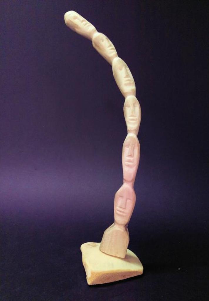 Lucy Tasseor Tutsweetok (1934-2012) - Totem With Seven Faces, c. 1980-1985, caribou antler,  12.5 x 6.25 x 5 in. 31.8 x 15.9 x 12.7 cm. S-1059