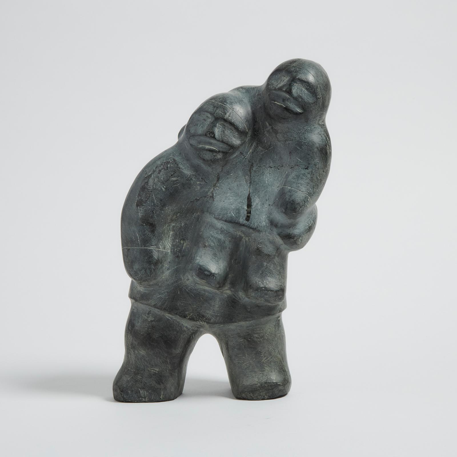 Barnabus Arnasungaaq (1924-2017) - Father Holding Child