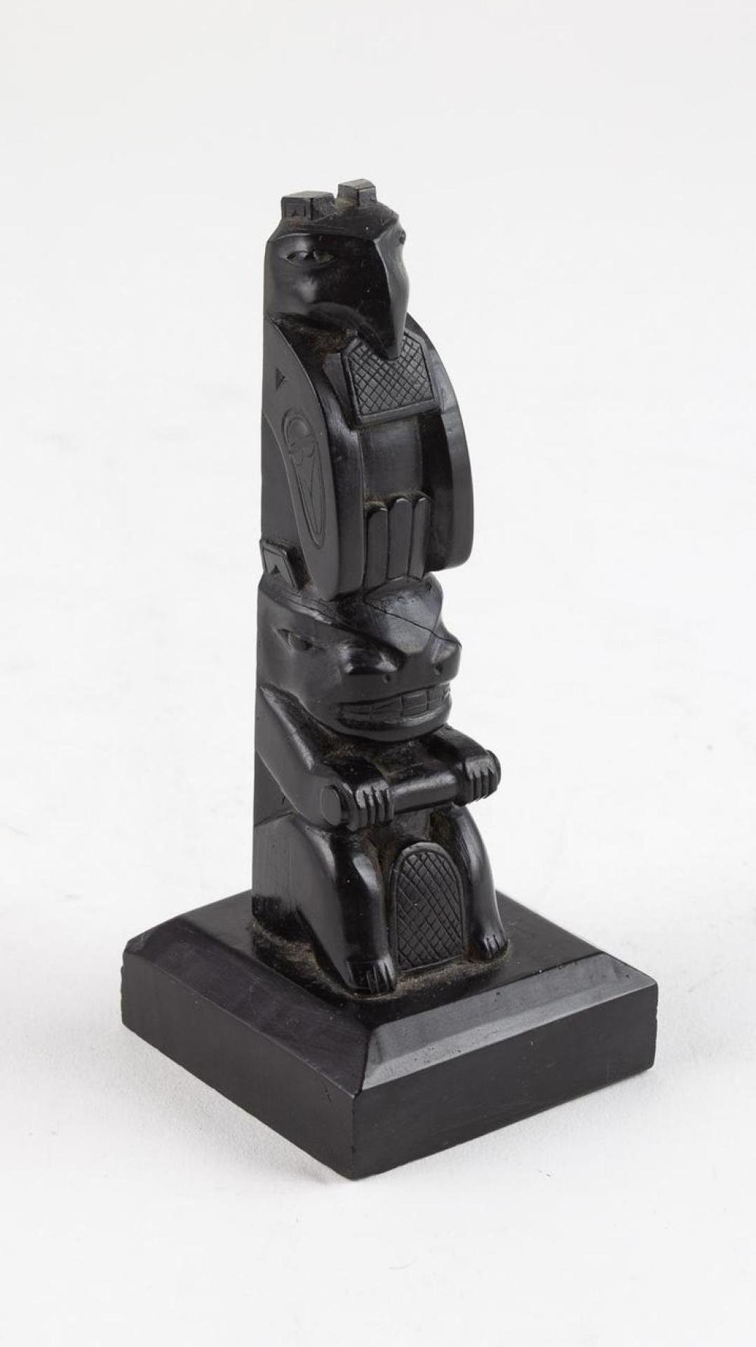 Ed Calder - a carved argillite totem pole