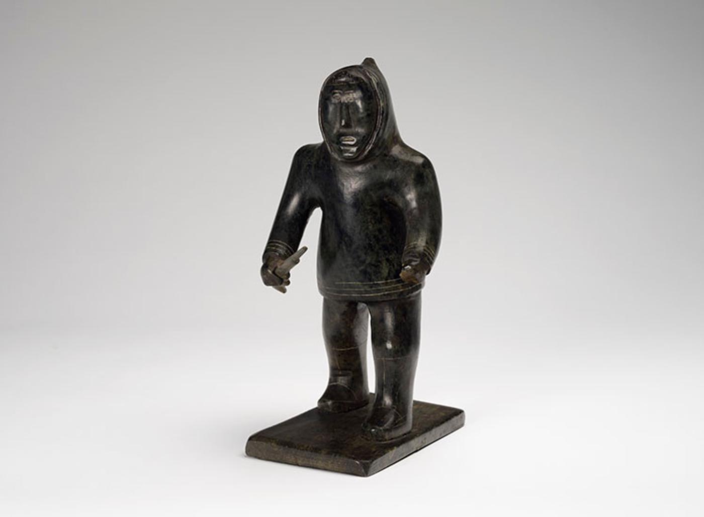 Joanasee Kakkik (1919) - Hunter Holding a Rifle