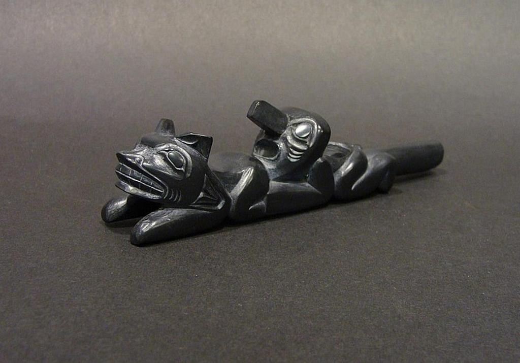 Glen Pollard (1957) - a carved two figure argillite pipe