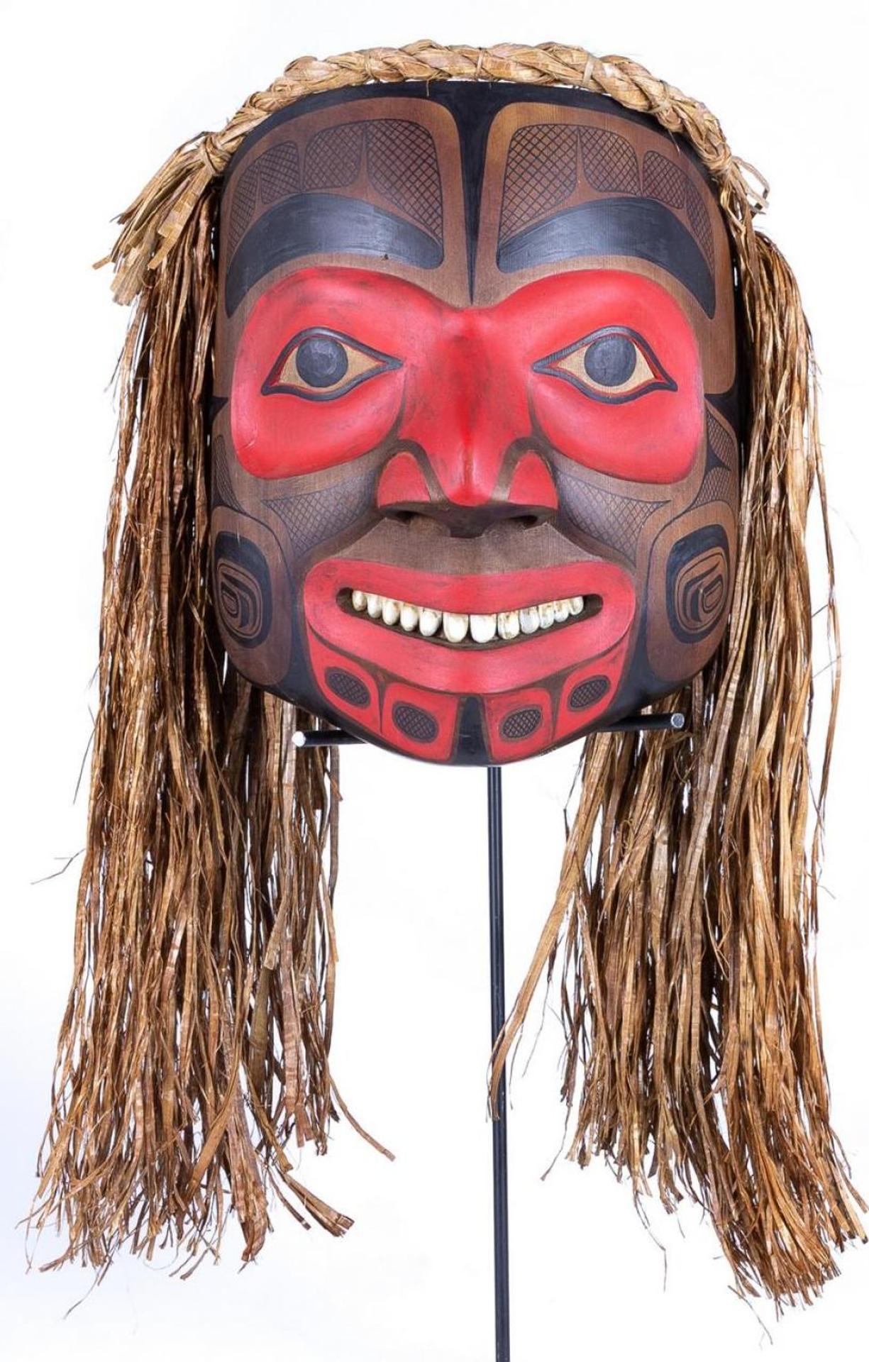 Glen Rabena (1953) - a carved and polychromed Flicker mask with cedar strip hair