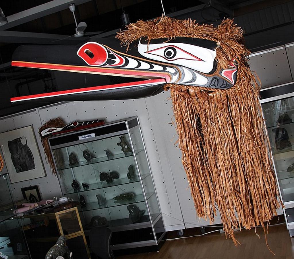 John Jacobsen (1883-1953) - a large carved and polychromed atriculated Huk Huk mask